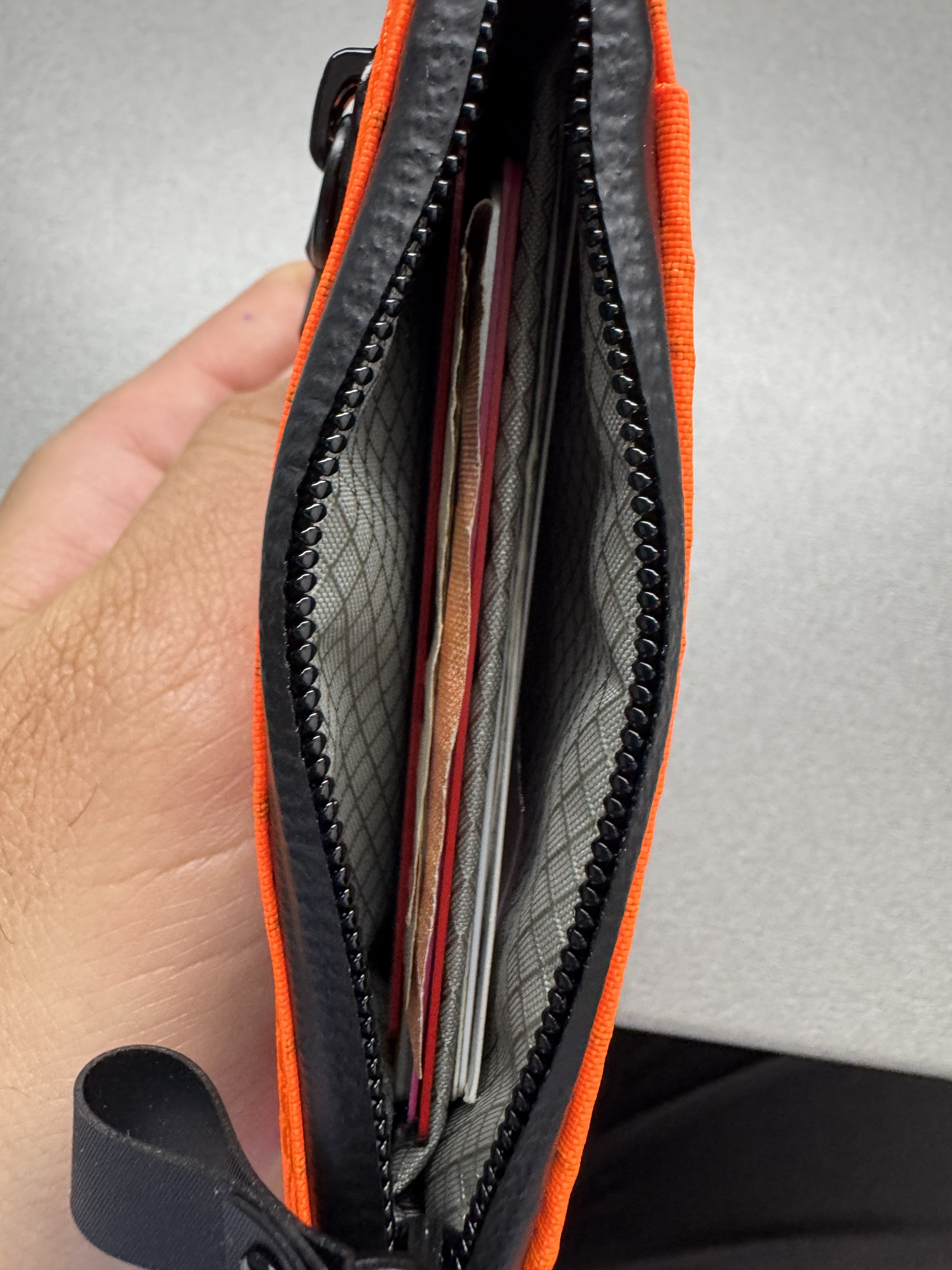 Orange Alpaka Zip Pouch Pro shown from the side