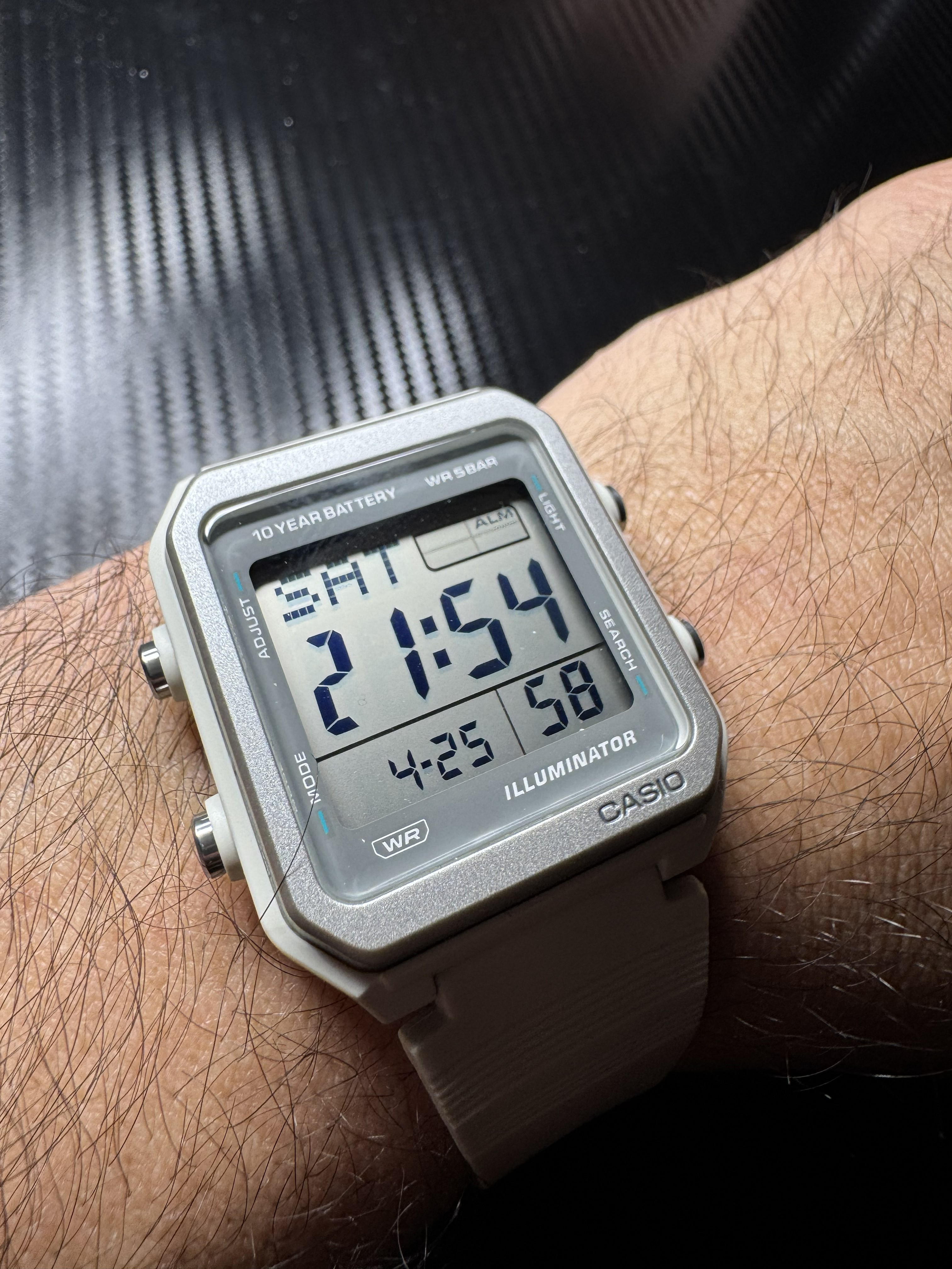White Casio W-221H digital watch