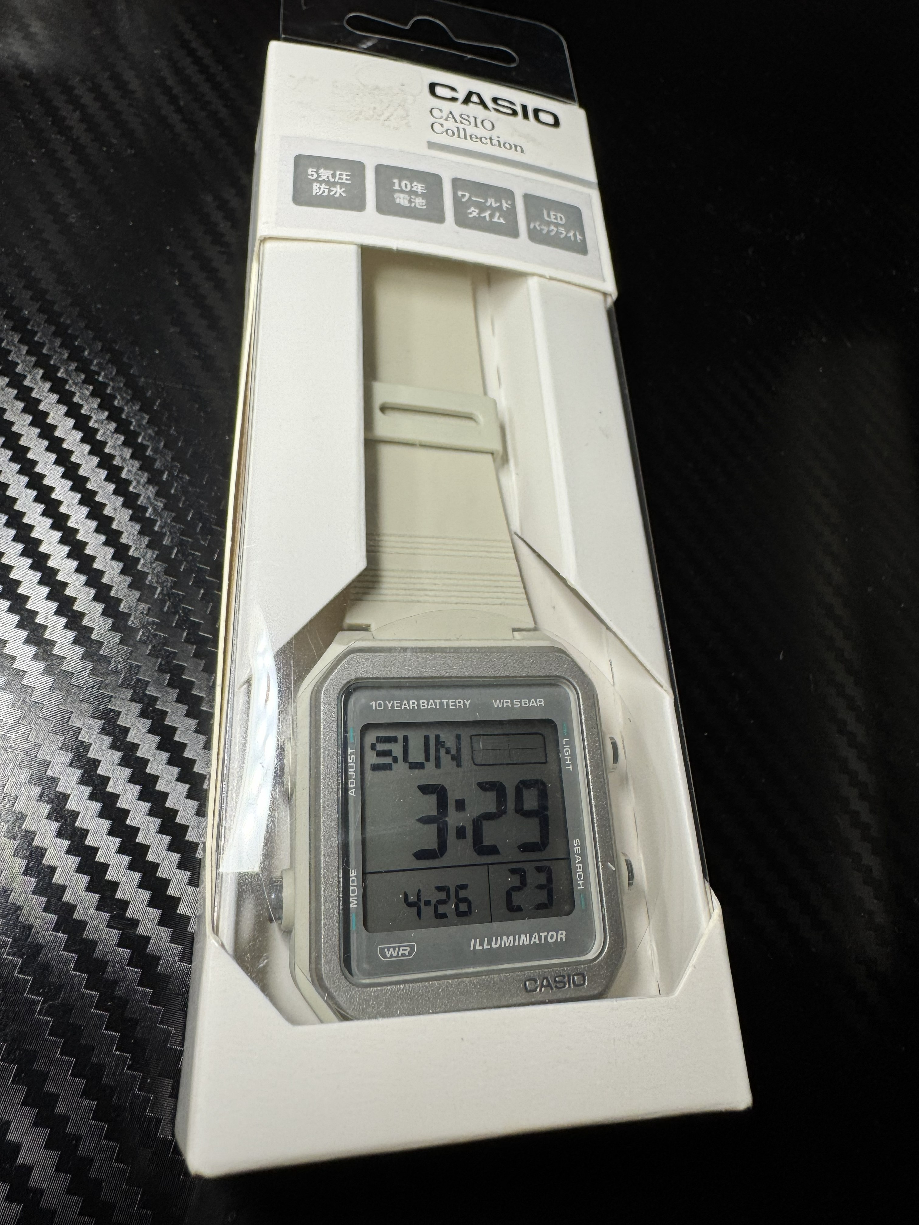 Casio W-221H digital watch on a wrist